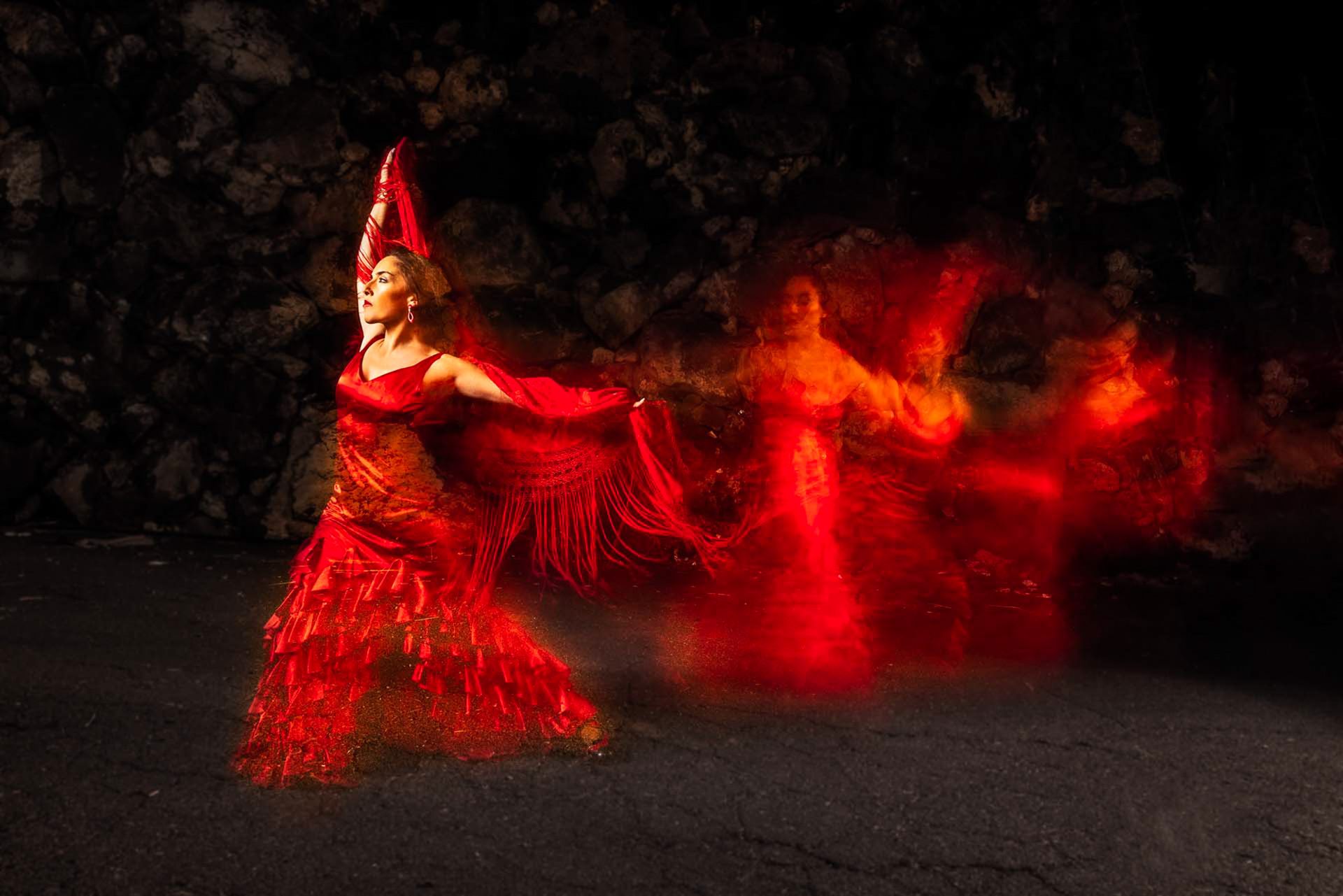 Long-exposure editorial portrait of a flamenco dancer in Alcalá